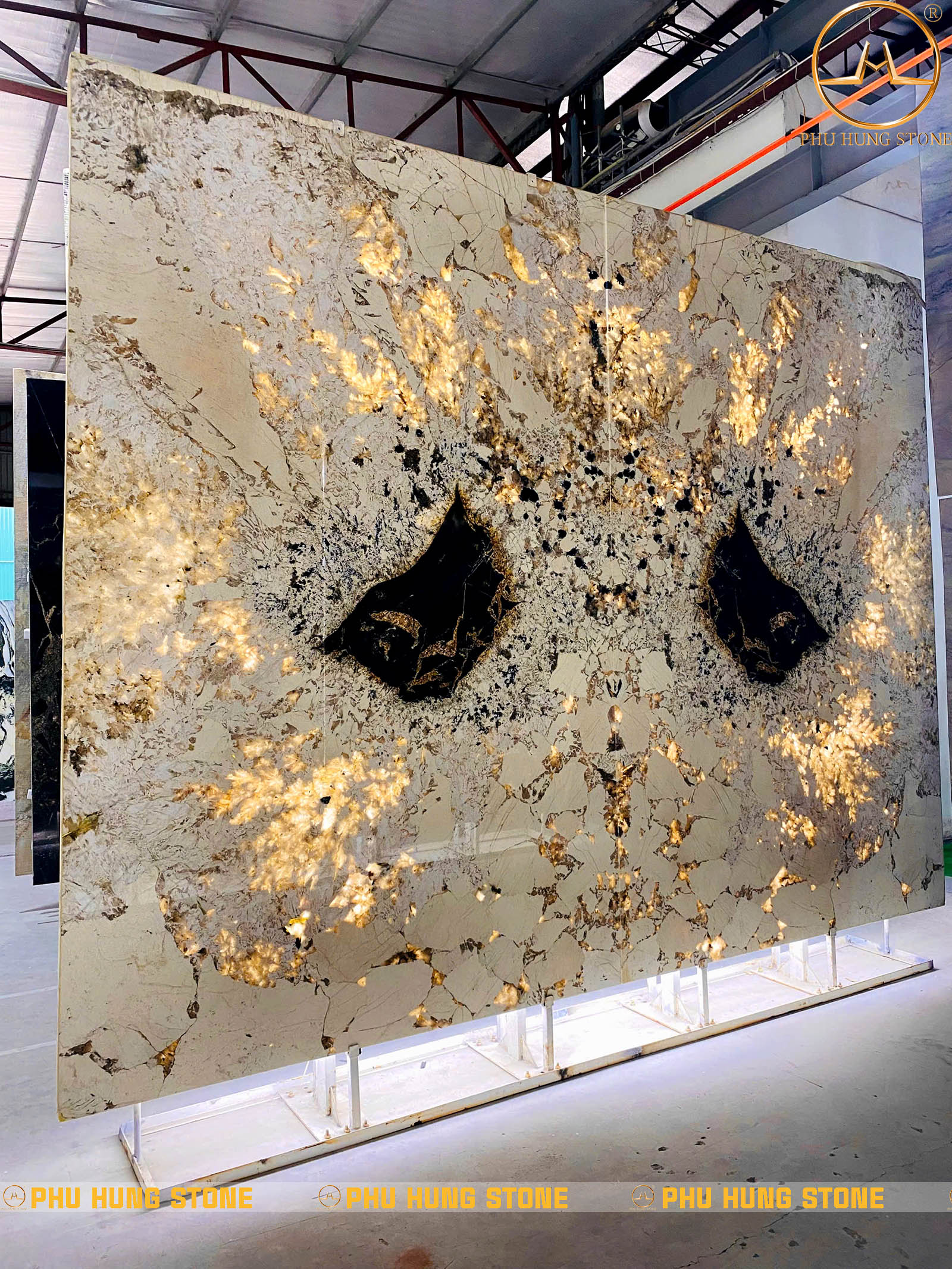 Hình ảnh Tranh đá tự nhiên xuyên sáng ghép đối xứng